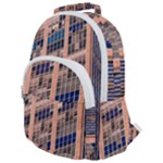 Low Angle Photography Of Beige And Blue Building Rounded Multi Pocket Backpack
