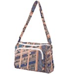 Low Angle Photography Of Beige And Blue Building Front Pocket Crossbody Bag