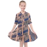 Low Angle Photography Of Beige And Blue Building Kids  All Frills Chiffon Dress