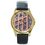 Low Angle Photography Of Beige And Blue Building Round Gold Metal Watch