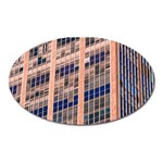 Low Angle Photography Of Beige And Blue Building Oval Magnet